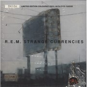 Click here for more info about 'Strange Currencies - Neon Green Vinyl + Badge + Shrink'
