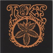Click here for more info about 'Toke - Orange - Orange & Black Pinwheel Vinyl'